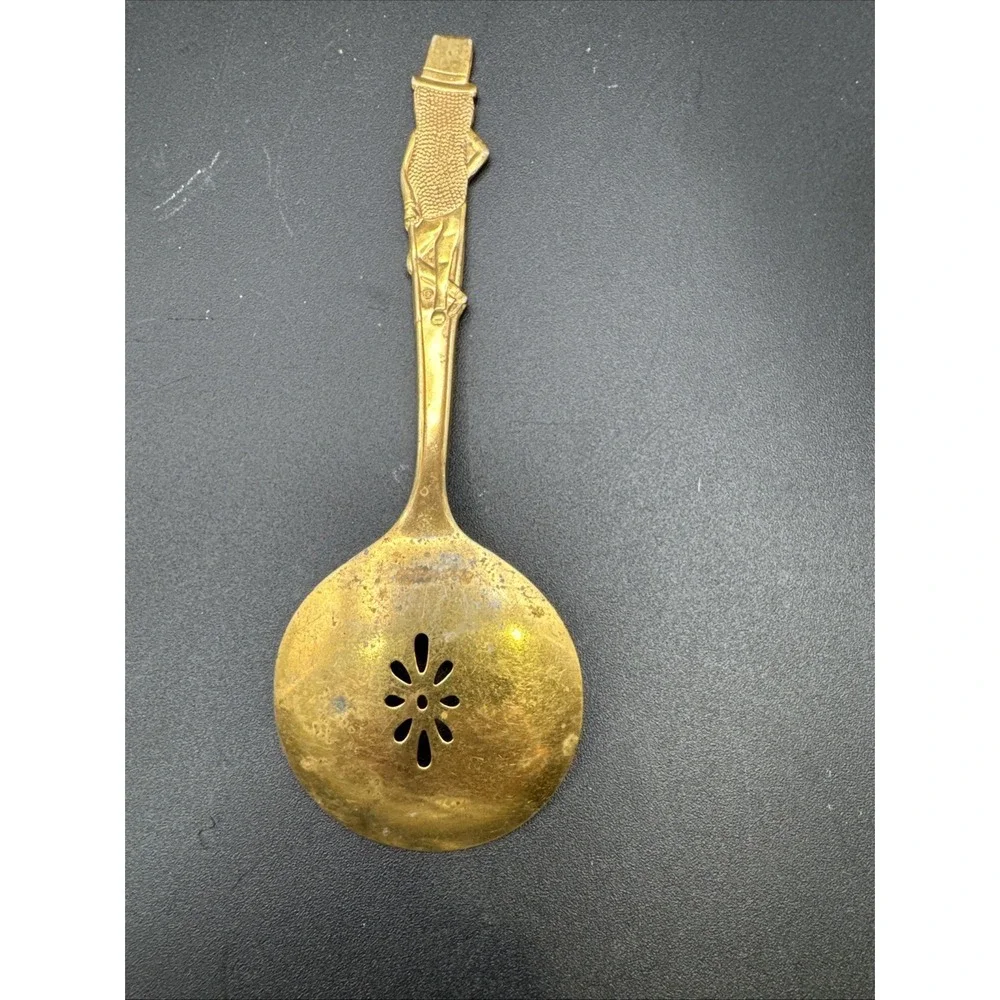Vtg gold-toned Planters Mr Peanut advertising slotted serving spoon